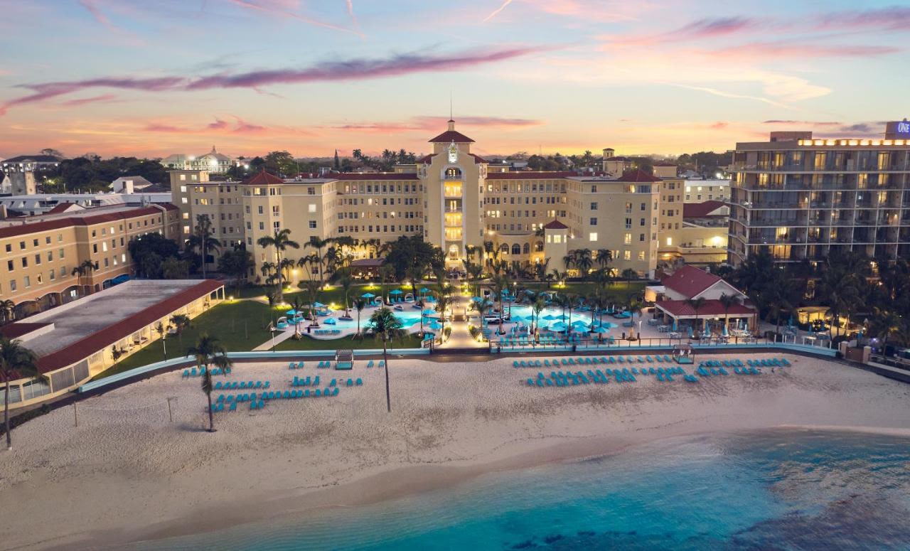 castle-like hotel on the beach with the ocean beside it